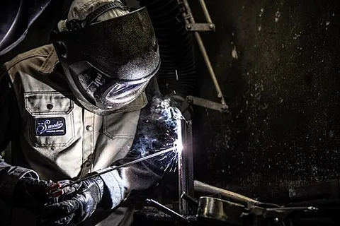 stick welding: a method of manual electric welding that uses a consumable flux-covered electrode that forms a slag...