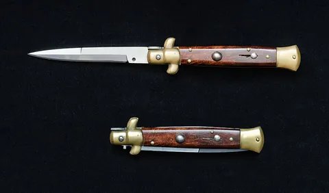 stiletto: a small, slender knife or dagger-like weapon intended for stabbing