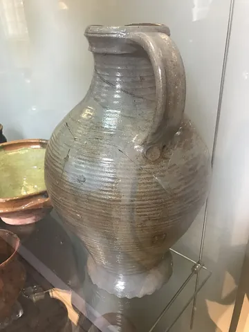 stoneware: a type of pottery that is fired at a high temperature and is dense, opaque and nonporous