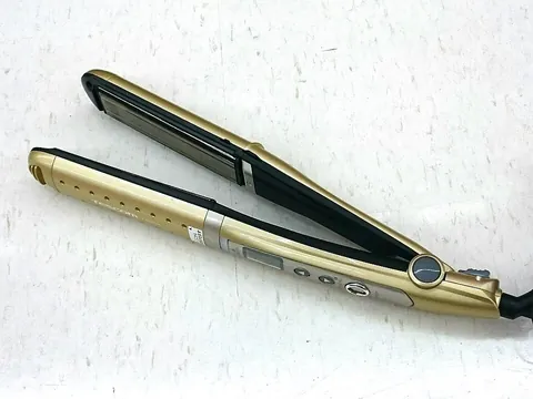 straightener: a pair of metal tongs with heated ceramic plates used for straightening hair