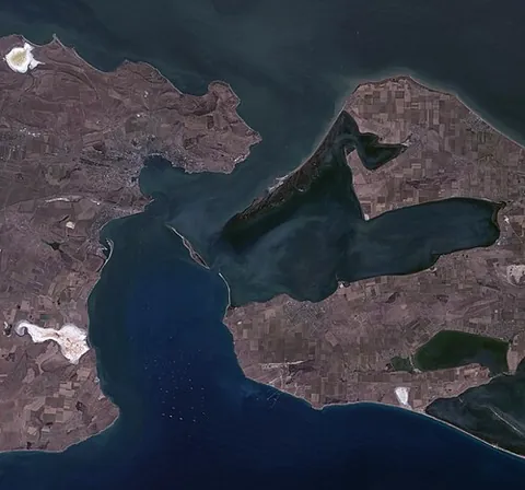 strait of kerch: a strait that connects the Black Sea and the Sea of Azov, separating the Kerch Peninsula of Crimea,...