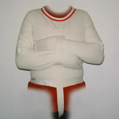 straitjacket: a jacketlike garment with very long sleeves which can be secured in place, thus preventing the...