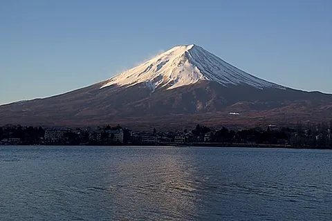 stratovolcano: a tall conical volcano, composed of layers (or strata) of hardened lava, tephra and ash
