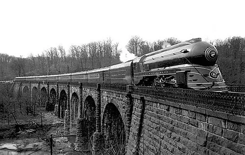 streamliner: one who or that which streamlines something