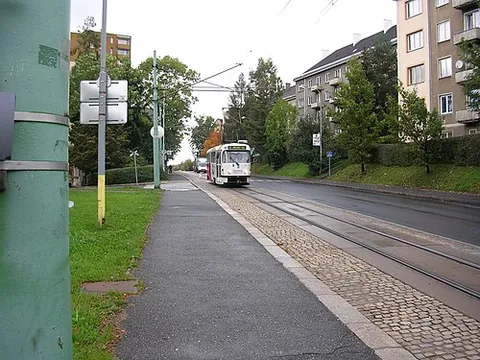 street railway: a tram line; public transportation operating on rails laid in public streets