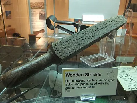 strickle: a rod used to level off heaped grain etc. when being measured, or concrete after pouring