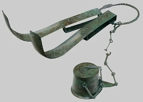 strigil: a grooming tool used to scrape away dead skin, oil, dirt, etc