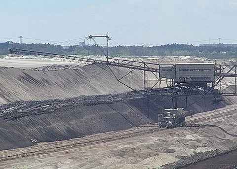 strip mine: a mine where the material above the ore is removed (stripped) to expose it for removal and use