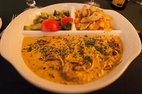 stroganoff: a dish of sautéed pieces of beef served in a sauce with sour cream
