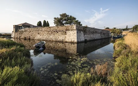stronghold: a place built to withstand attack; a fortress