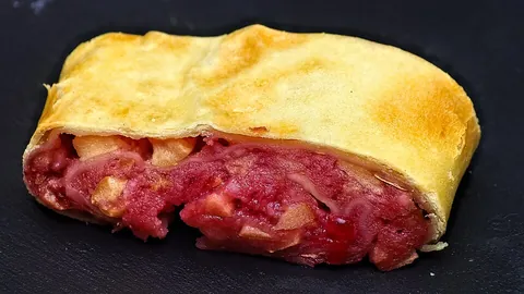 strudel: a pastry made from multiple thin layers of dough rolled up and filled with fruit, etc