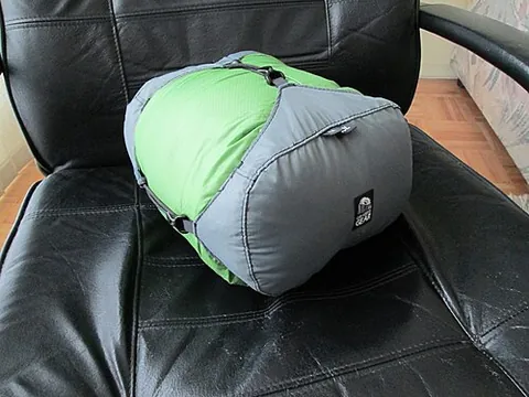 stuff sack: a simple drawstring bag, often used for storing compressed sleeping bags