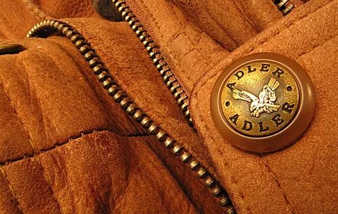 suede: a type of soft leather, made from calfskin, with a brushed texture to resemble fabric, often used...