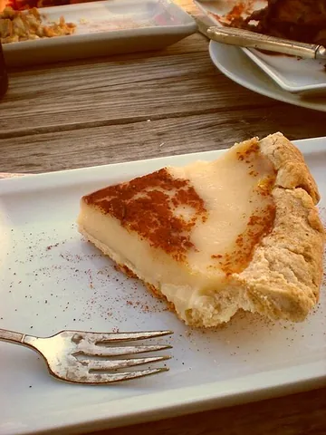 sugar cream pie: a single-crust pie with a smooth, jiggly filling made from flour, butter, salt, vanilla, cream, and...