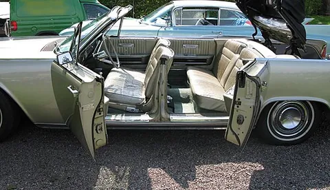 suicide door: a car door hinged towards the rear of the vehicle