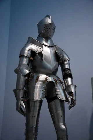 suit of armour: a collection of garments, usually made of metal, worn over the body for protection in battle from...