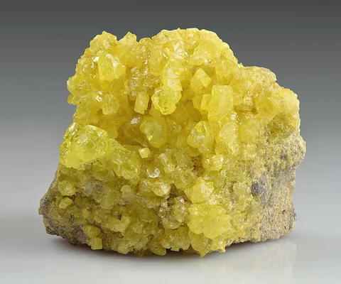 sulfur: a chemical element with atomic number 16, having a bright yellow color and characteristic smell,...