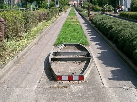 sump buster: an access control device consisting of a concrete block or similar obstacle, too high for cars but...
