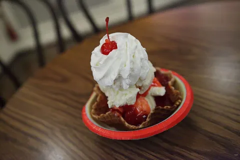 sundae: a dessert consisting of ice cream with various toppings