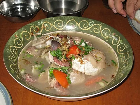 sup kambing: a Southeast Asian soup made with goat meat, tomato, celery, spring onion, ginger, candlenut, and...