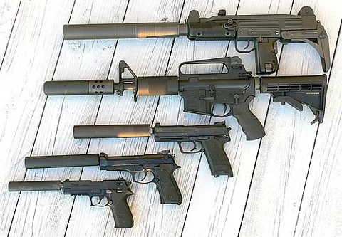 suppressor: a device which suppresses something, especially an electronic or mechanical device