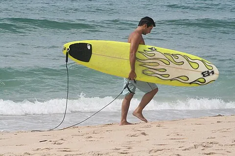 surfboard: a shaped waterproof plank, usually made of wood or foam and reinforced plastic, used to surf on...