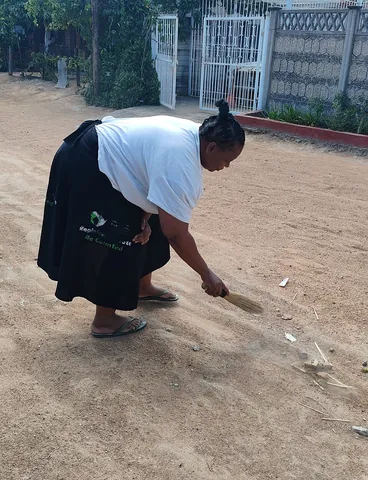sweep: to clean (a surface) by means of a stroking motion of a broom or brush