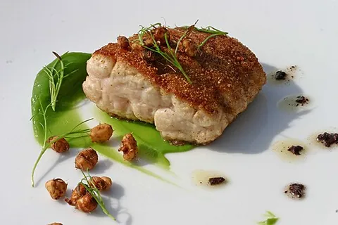 sweetbread: the pancreas or thymus gland of an animal, especially a lamb or calf, as food