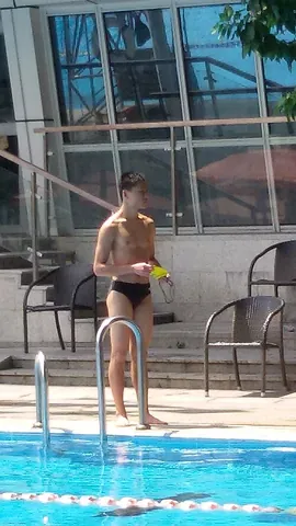 swimming briefs: a male briefs-style swimsuit such as those worn in competitive swimming, diving, and water polo