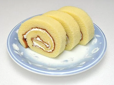 swiss roll: a type of sponge cake rolled up into a cylinder, typically but not exclusively with jam or...