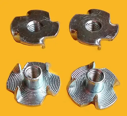 t-nut: such a nut die-formed from sheet metal and used in woodworking