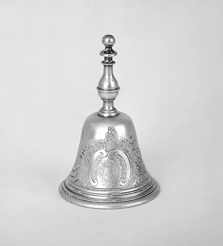 table bell: a hand-held bell intended to be rung in a dining room to call for service, but also used to call...