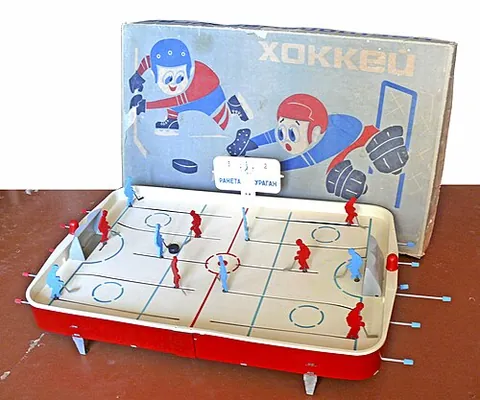 table hockey: a table-top game version of ice hockey played by two players against each other