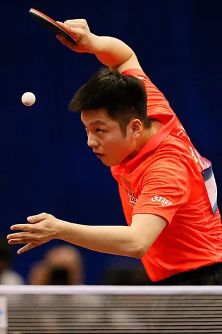 table tennis player: a person who plays table tennis, especially professionally