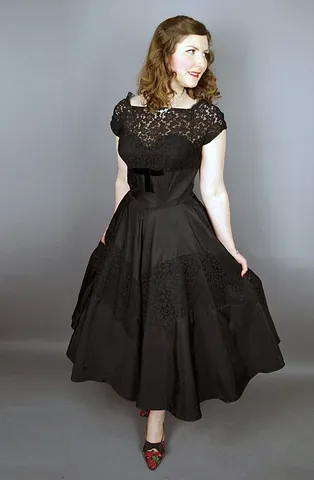 taffeta: a crisp, smooth woven fabric made from silk or synthetic fibers