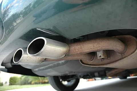 tailpipe: an exhaust pipe exhausting to the aft of the vehicle