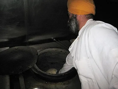 tandoor: a cylindrical clay oven used in the cuisine of the Caucasus, Middle East, and Indian subcontinent...