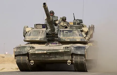 tank: a closed container for liquids or gases