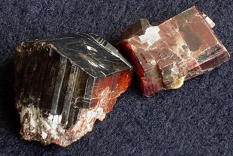 tantalite: a dark-brown mineral that is an ore of tantalum and niobium, of the chemical formula (Fe, Mn) Ta₂O₆