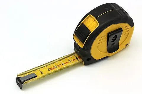 tape measure: a graduated flexible ribbon used for measuring lengths