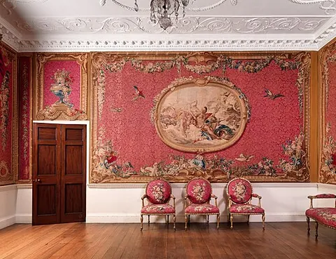tapestry: a heavy woven cloth, often with decorative pictorial designs, normally hung on walls