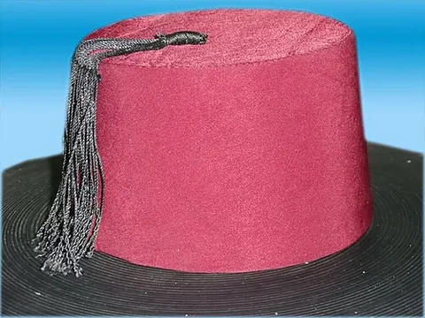 tarboosh: a red felt or cloth cap with a tassel, worn in the Arab world; a fez