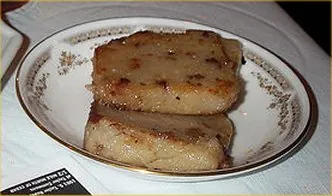 taro cake: a type of savoury Chinese cake made from flour and taro, often topped with fried shallots and...
