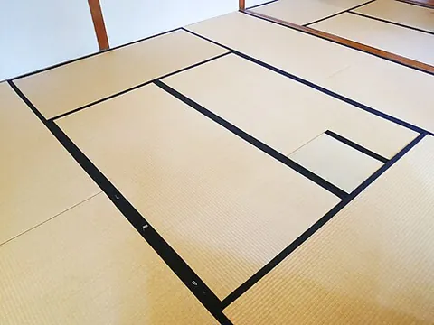 tatami: straw matting, in a standard size, used as a floor covering in Japanese houses