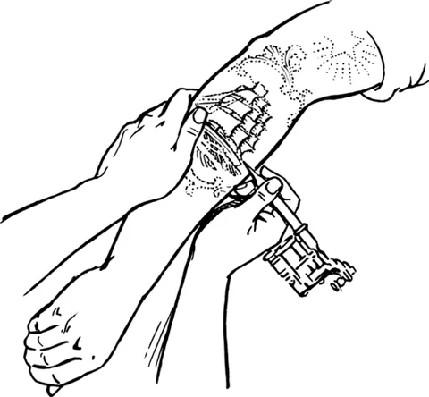 tattoo machine: a small hand-held device used for applying tattoos