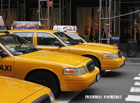taxi: a vehicle that may be hired for single journeys by members of the public, particularly one with an...