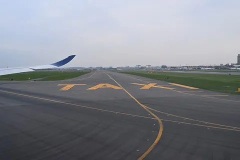 taxiway: a road or path within an airport designated for the taxiing of aircraft connecting the runways with...