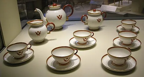 tea set: a set of crockery for making and serving tea (the drink)