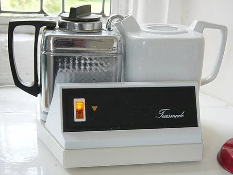 teasmade: a household appliance for making tea automatically, often with an alarm clock so that tea can be...