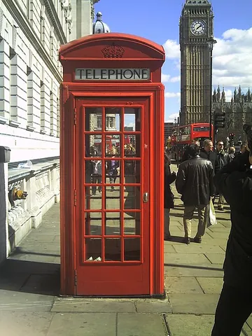 telephone box: a small enclosure housing a public telephone (usually a payphone)